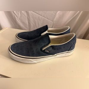 Dark blue “off the wall” printed, slip-on vans